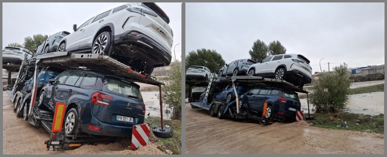 Un camión góndola portacoches queda atascado en el Camino Senda de la Paloma de Tarancón por las intensas lluvias
